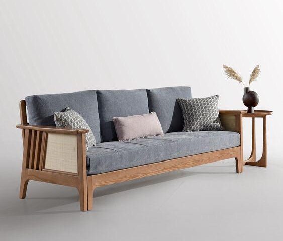 Grey Upholstered Cane-Arm Sofa Bed